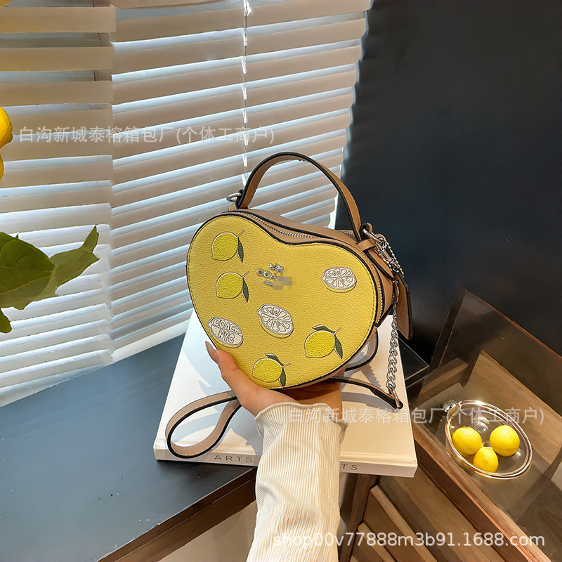 Bolso de mano en forma de corazón de comercio exterior, bolso de hombro de impresión de moda creativa, bolso de hombro simple, bolso de hombro de dama de Europa y América.