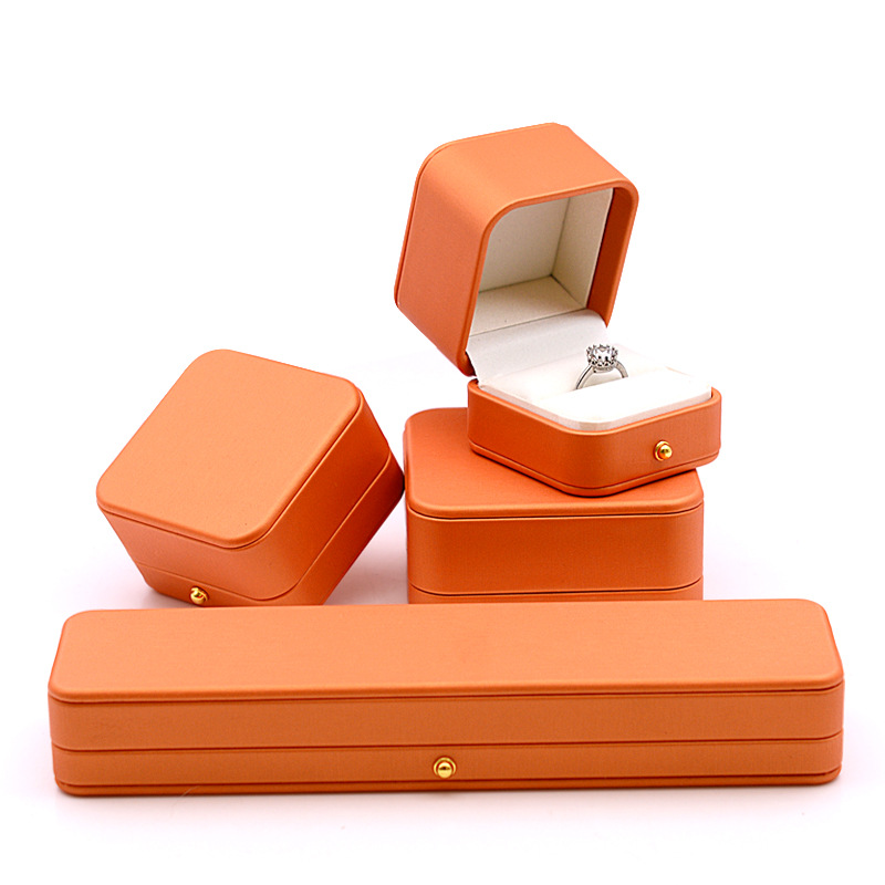 Caja de anillo naranja caballo hebilla de oro caja de anillo caja de pulsera caja de collar caja de oreja caja de broche caja de insignia