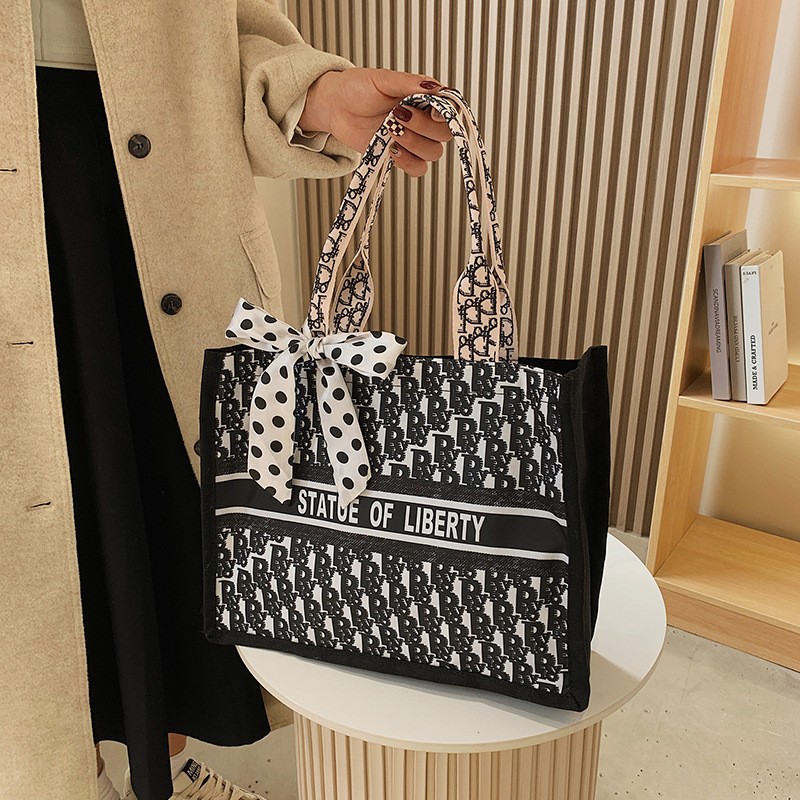 Bolsa de hombro de lona de gran capacidad bufanda de seda casual de mujer nueva moda bolsa de compras estudiante cubo Portátil Bolsa de maquillaje cuadrado