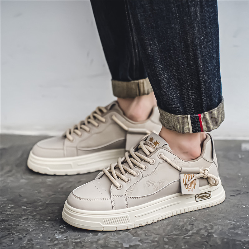 Otoño nuevos zapatos de skate transpirables de altura baja, zapatos de nicho de cuero casuales, zapatos deportivos para hombres en vivo.