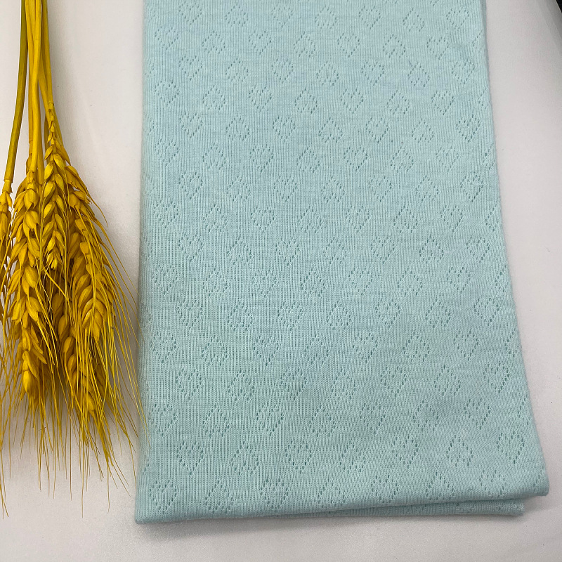 现货供应夏季甜美短袖BN纯欲风小吊带针织镂空爱心面料镂空设计