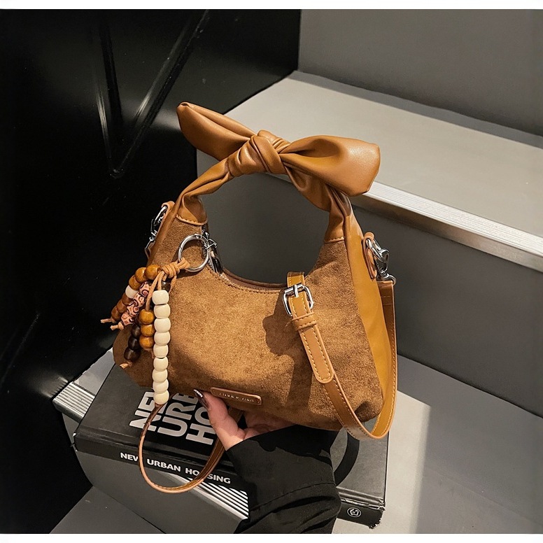 2025秋季新款时尚简约饺子包女休闲手提洋气单肩包高颜值斜挎小包