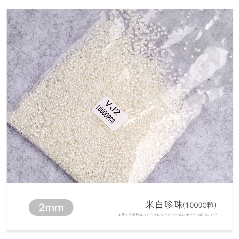 Venta al por mayor blanco beige tamaño semicírculo perla tridimensional paquete DIY hecho a mano uñas joyas de perlas planas