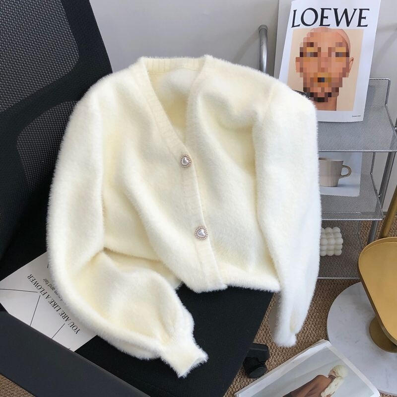 The lazy style, thickened, loose-fitting knitted cardigan is a lovely sweater, perfect for petite women, and features a short, autumn/winter design with a mink-like texture