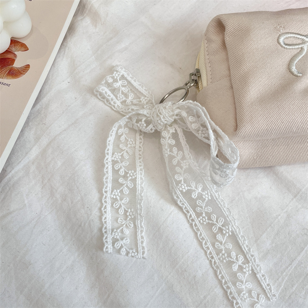 66g Weight Canvas Lining Material Lace Fashion Element Zipper Closure Type / Strap Type Cosmetic Bag Bags Type Holiday, Travel, Daily Occasion Polyester Material Bag, Knot, Butterfly, Bow Knot Pattern All Seasons Season Women's Gender Cute Style Square Shape Cute Bag Knot Butterfly Polyester Lace Square Makeup Bags 15