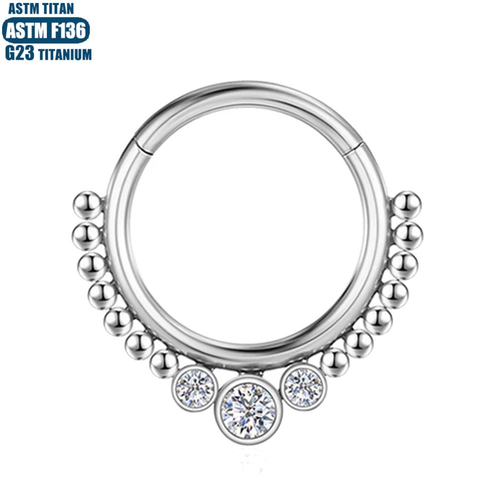 Silver pointed spike labret stud material detail