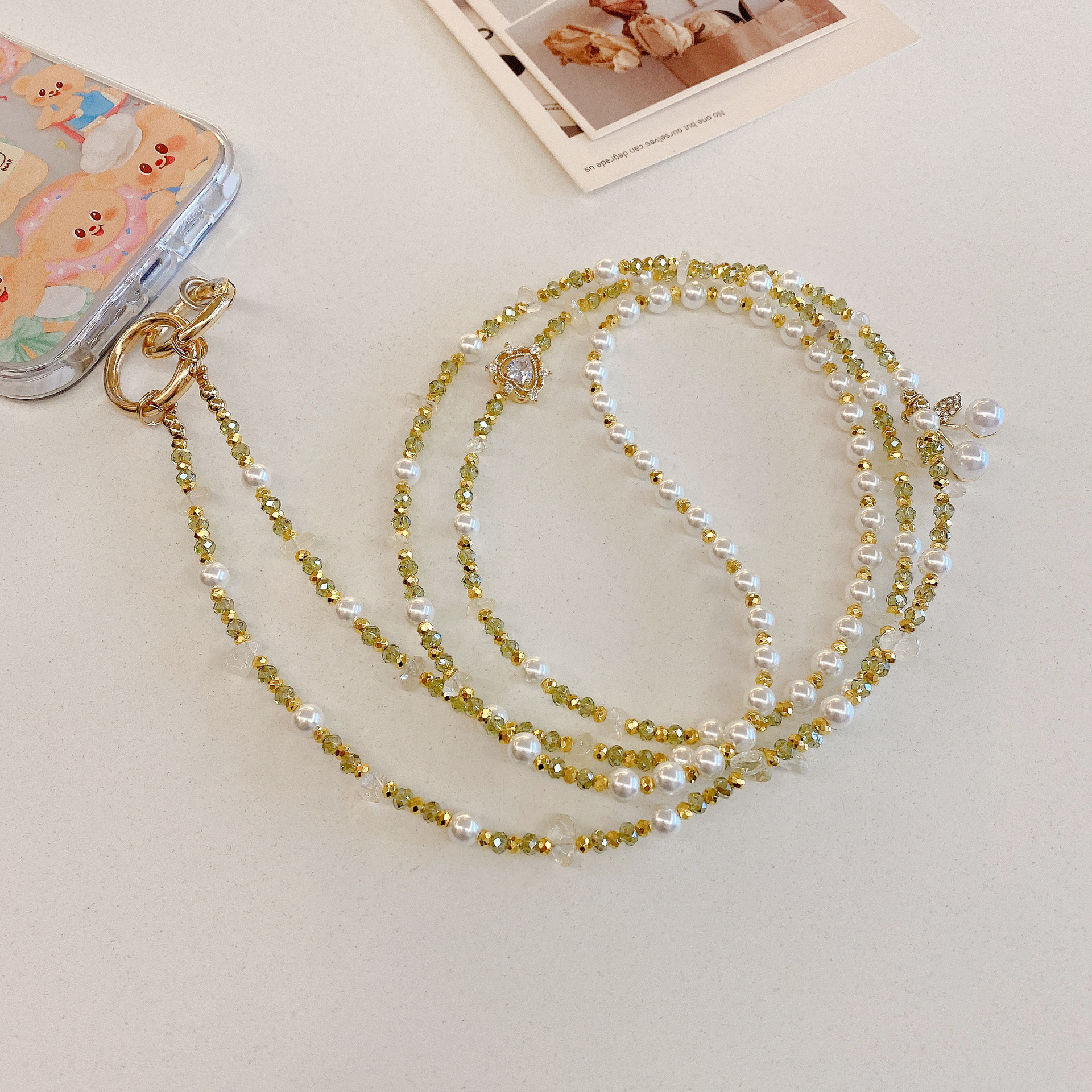 Boutique hecho a mano de alta gama para teléfono móvil cadena larga de cereza pequeña verde oliva cordón de teléfono móvil de moda colgante de mensajero largo