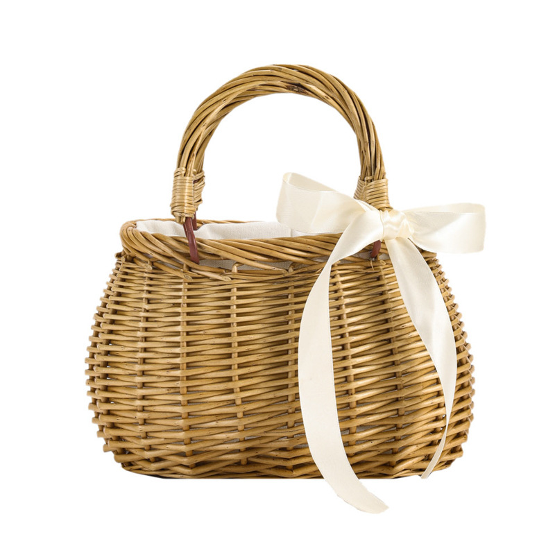 Geweven rattan schoudertas met lederen afwerking mandtas_voghion.com