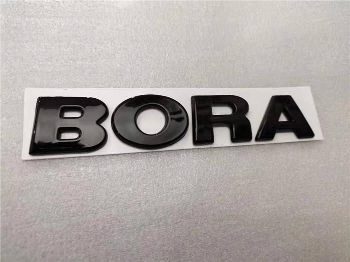 Black FAW-Volkswagen Jetta, Golf, Sagitar, Magotan, and Bora car emblems, Jetta rear lettering