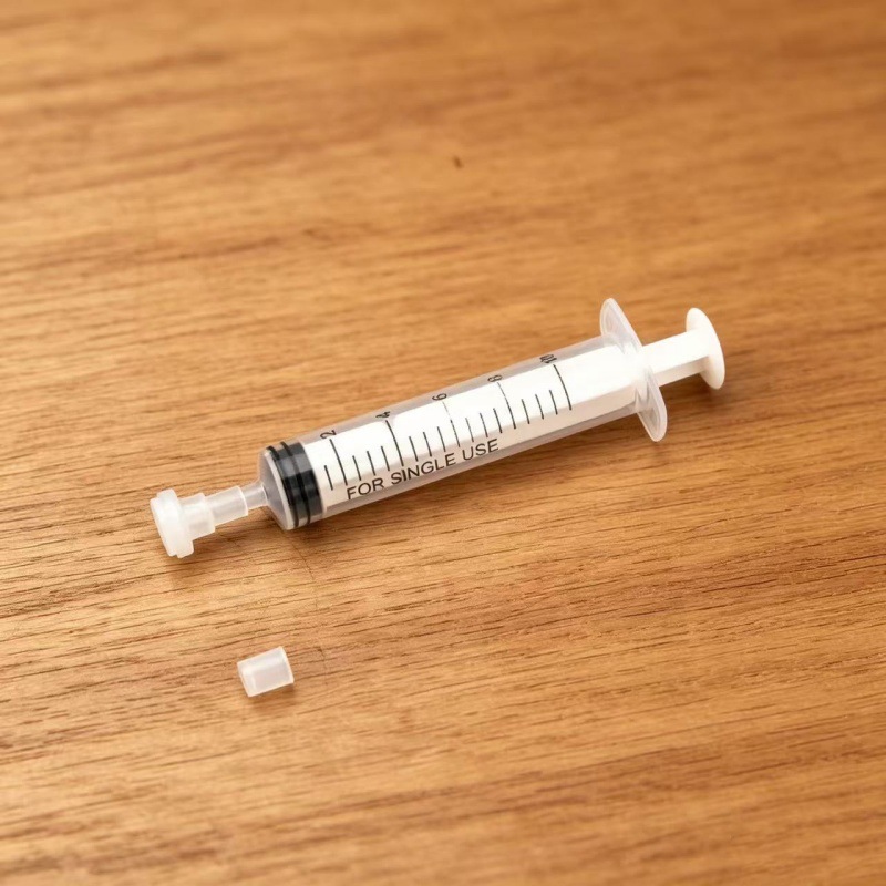 Jeringa de 10 ml + (cabezal de conversión para bombeo)