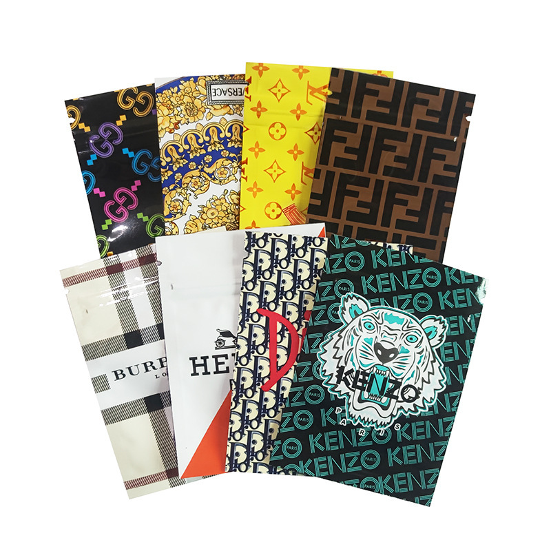 100个价现货1g卡通镭射糖果袋子跨境外贸包装袋6x14cm/7x10cm