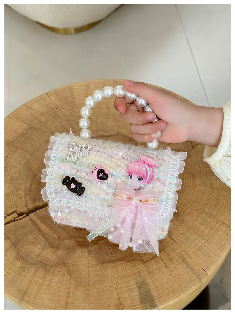 Primavera y verano nuevos bolsos infantiles, bolsos de perlas de arco, bolsos de mano, princesa de estilo extranjero, bolsos de cambio de hombro