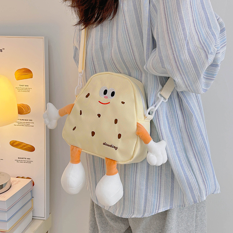 Bolsos de hombro de dibujos animados japoneses para niños y niñas lindos y interesantes pequeñas galletas bebés mochila 2025 nuevo tipo de bolsos para niños