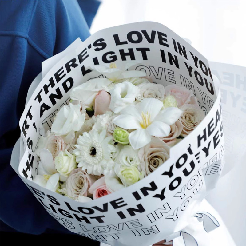 鲜花包装纸眼里有光包花纸整箱批发防水花艺材料花束包装纸花艺包