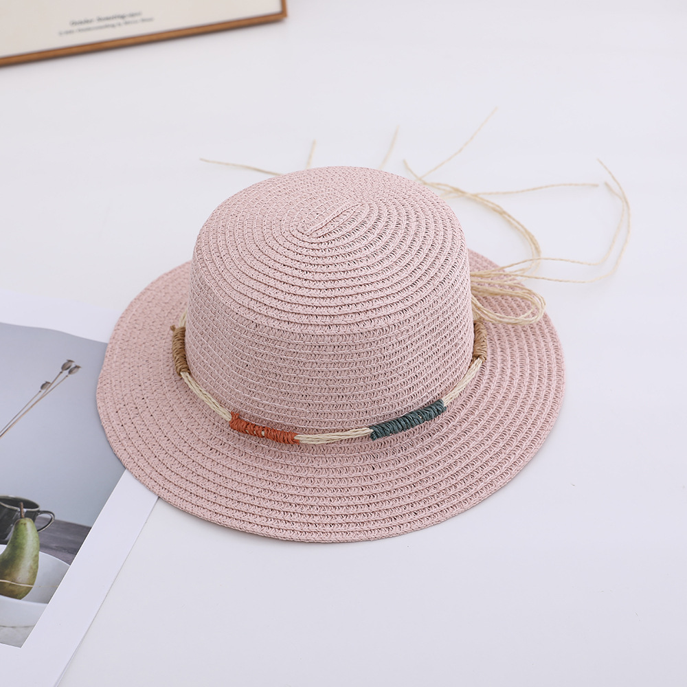 Versión coreana del nuevo sombrero femenino primavera y verano gran ala sombrero para el sol sombrero para el sol de vacaciones protector solar al aire libre sombrero de paja ajustable al por mayor