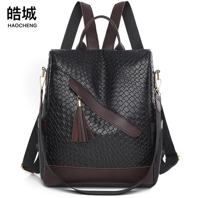AliExpress 2025 nueva mochila antirrobo para mujer súper caliente simple y versátil mochila de doble uso con borlas de moda al por mayor