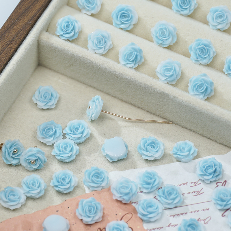 穴のない細いキラキラの柔らかいゴムの花の光はバラの花の片面の彫刻のdiyの手作りの数珠のネイルの携帯電話のケースの材料を変えます。