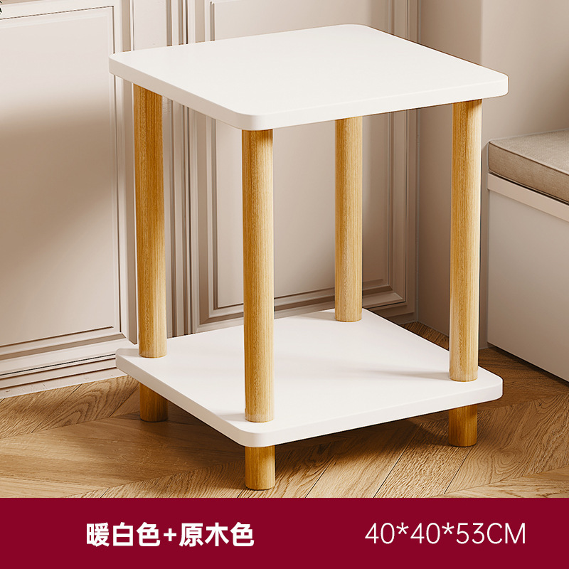 小さいテーブルのソファーの辺のいくつかのお茶のいくつかの家庭は移動することができます。|undefined