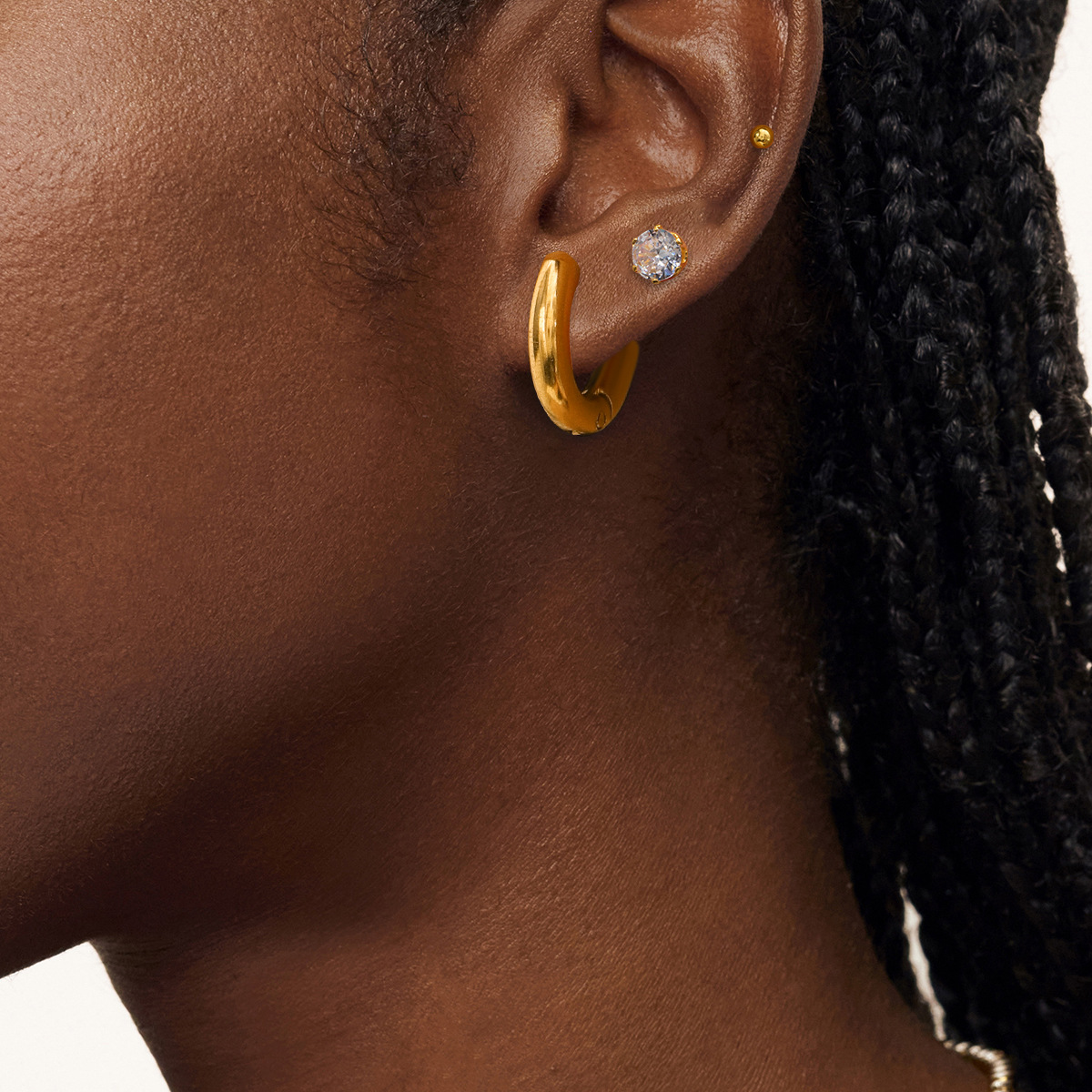 Wanxing Europa y América acero inoxidable tres a uno conjunto de zircon anillo simple pernos de orejas pendientes de acero de titanio simple joyas transfronterizas