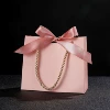 Fuchsia bag, handheld hair band