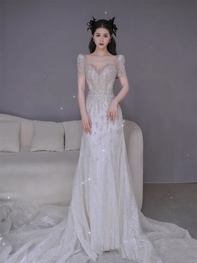 Nuevo vestido de novia estilo sirena francés 2026 con cola para bodas transfronterizas, con una elegancia súper mágica para la novia.