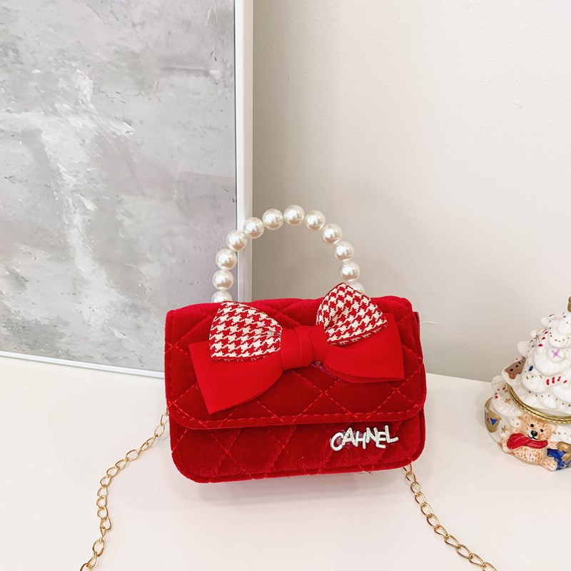 Bolso de niños nuevo bolso de perla rojo de Año Nuevo lindos princesas niñas bolso de hombro de cadena de estilo extranjero bolso de mochila