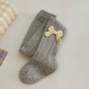 Tights with bow, with embroidery