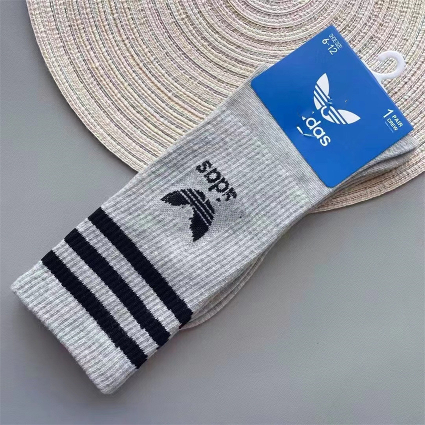 2024 primavera y otoño AGREGAR calcetines de baloncesto deportivos de media pantorrilla de tres hojas de hierba alta marca de moda corriendo calcetines de fútbol