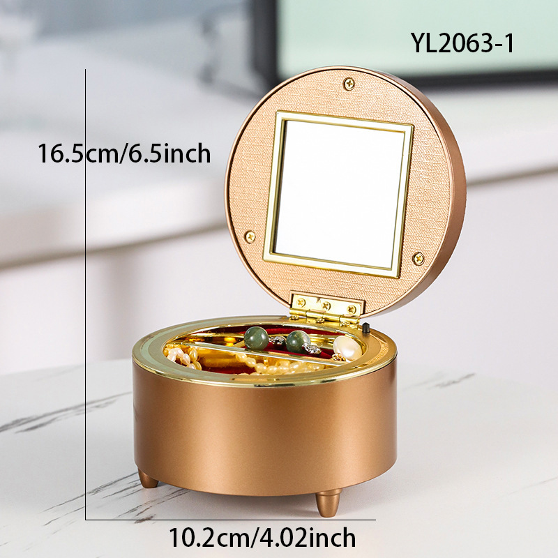 Caja de música redonda para joyería - marrón