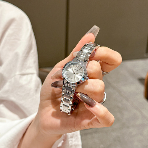 Aiqi's new student fashion temperament ladies watch commuter strap calendar niche light luxury casual steel strap quartz watch