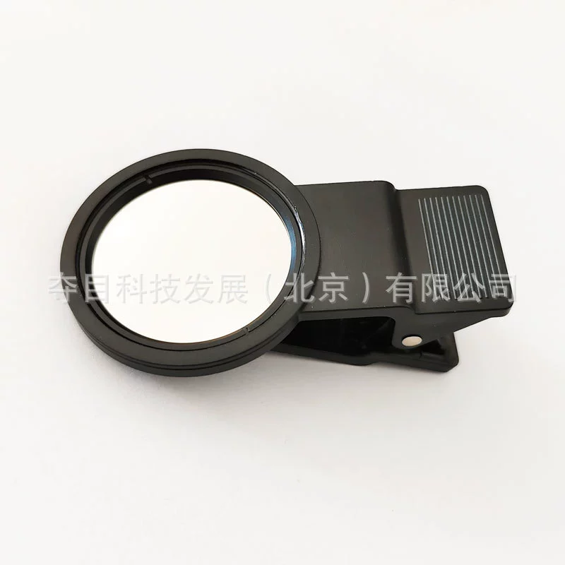 Солнечный мобильный телефон зажимает пленку затмения