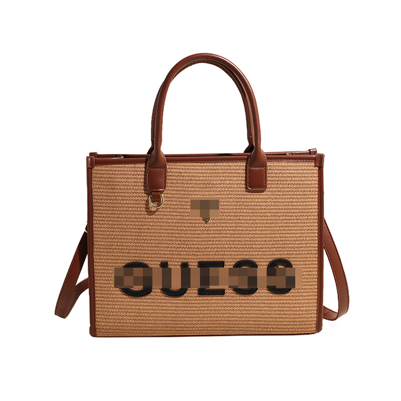 Bolso tejido portátil para mujer nuevo bolso tote con letras portátiles de gran capacidad diseño de ocio bolso de paja salvaje de estilo occidental