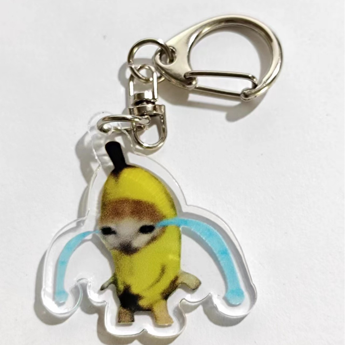 Comida Cabeza de gato Plátano Gato Emoji Llavero Red de Internet Escultura de arena Spoof Cat Little Red Book Estilo explosivo Colgante de mochila escolar