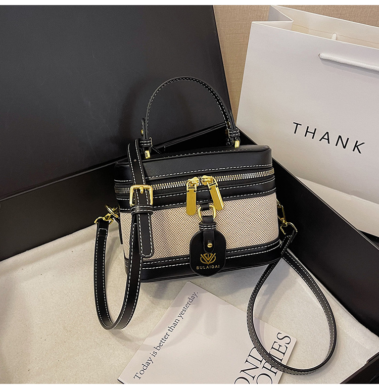 Bolso de mano de alta sensación para mujeres 2025, nueva moda transfronteriza, bolso de caja de empalme de color, bolso casual, bolso cuadrado simple