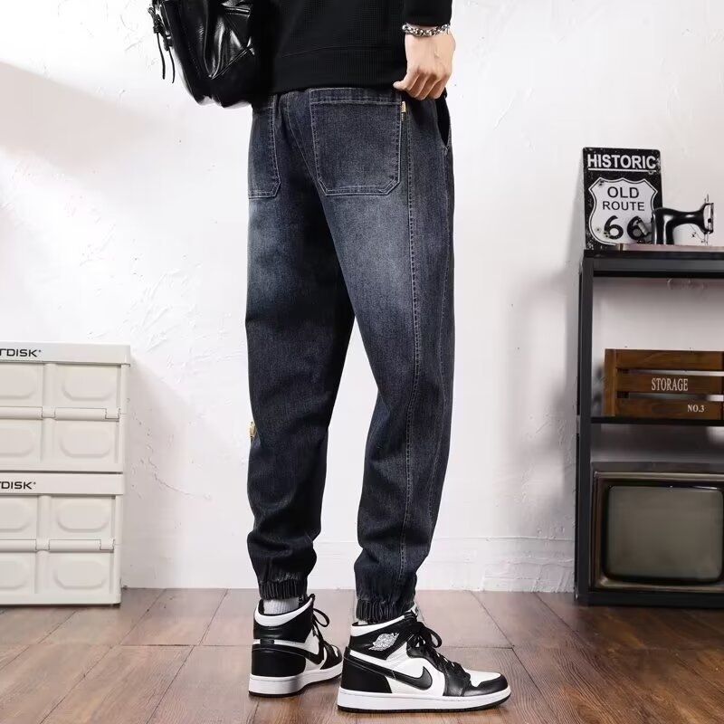 2024 primavera y otoño pantalones vaqueros de cintura elástica todo fósforo para hombres, pantalones de pierna ancha rectos sueltos para adolescentes de la calle principal