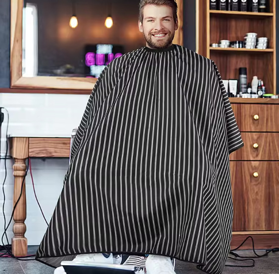 Fábrica al por mayor de tela de peluquero paño de peluquería adulto paño de corte de pelo al por mayor 1,4*1,6