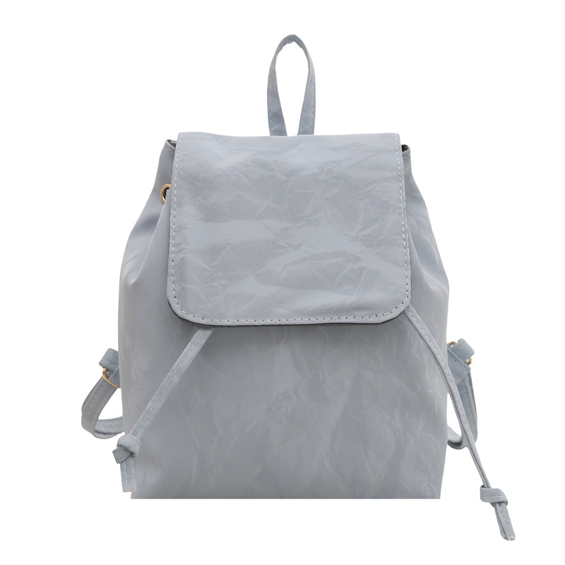 Mochila pequeña e retro ins estilo occidental mujer 2025 primavera nueva mochila de costura literaria simple y ligera