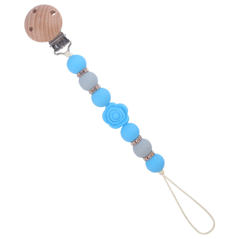 Nuevo bebé de dibujos animados de doble cara Rosa mordedor creativo DIY flash cuentas de ladrillo silicona mordedura pezón cadena anti-caída