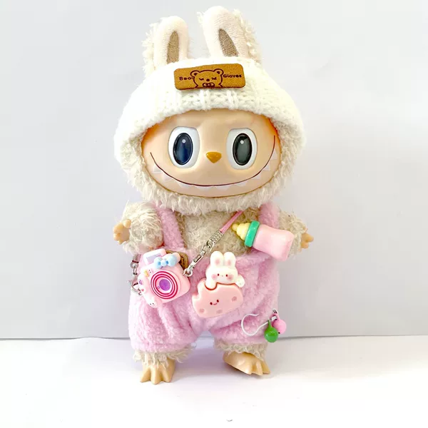 Fuchsia feeding bottle, overall, hat, camera