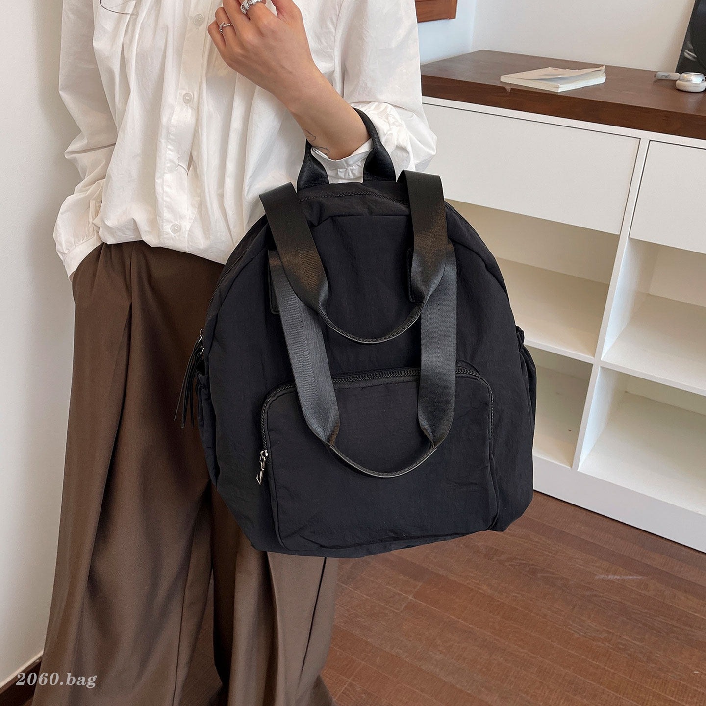 Bolso de moda temperamento 2026 bolso de gran capacidad de viaje mochila ocio simple versátil nuevo estudiante en clase