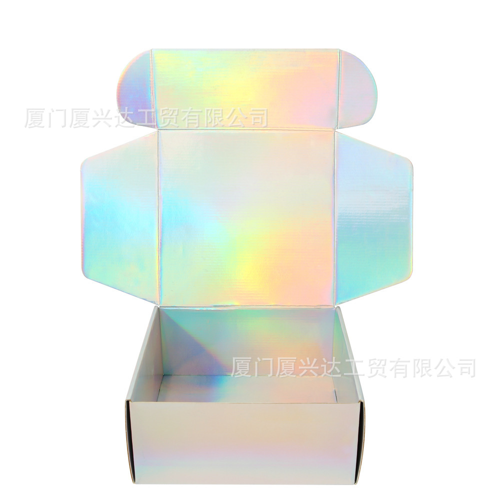 Caja de avión de papel ondulado de oro y plata láser caja de embalaje expreso duro caja de regalo de stock caja de regalo de fiesta