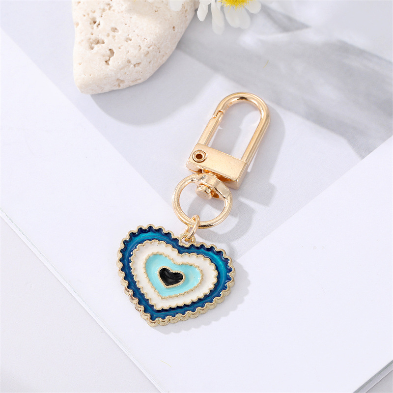 Simple Colorful Eyes Heart Keychain Alloy Irregular Round Bag Pendant Accessories display picture 4