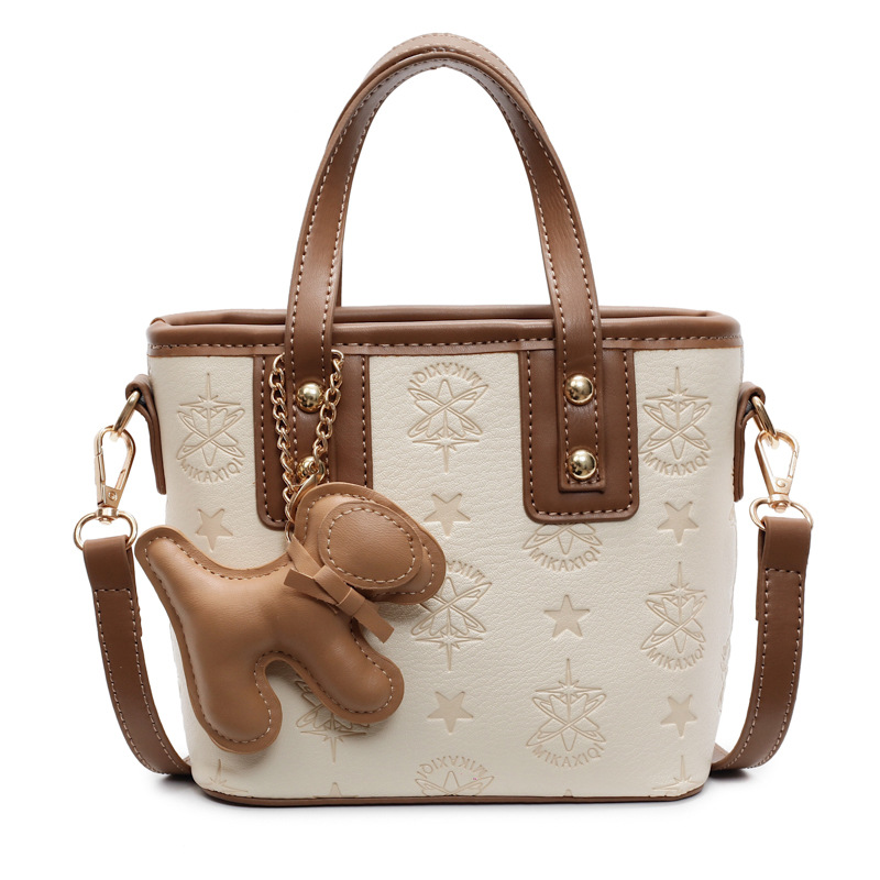 Bolso de mano popular para mujeres 2025 nuevo bolso de cubo de agua de textura casual versátil de alta calidad bolso de hombro