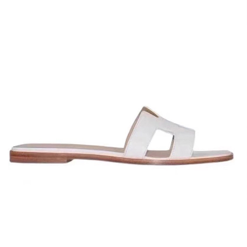 鼎羊皮の新型真皮平底ネット赤同タイプのスリッパ女性夏外着一字引きビーチカジュアル太さと涼しさ引き