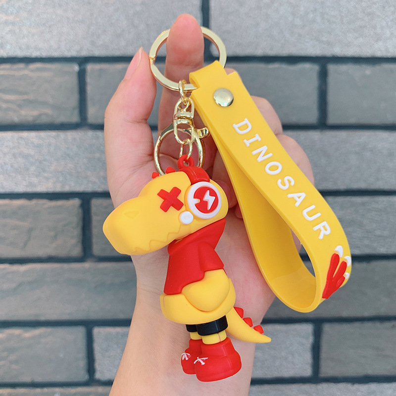 Dinosauro llavero música rayo pequeño dinosaurio muñeca de silicona bolso llavero de automóvil colgante moda regalos frescos