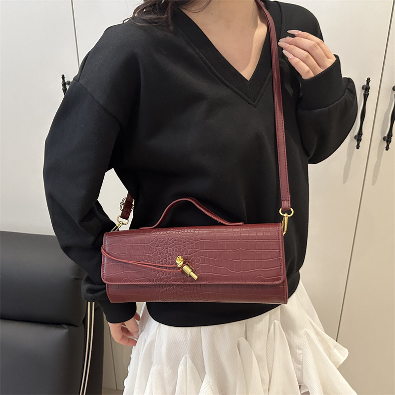 Bolso de cena 2025 primavera y verano nuevo estilo temperamento bolso de palo bloqueo oblicuo bolso horizontal bandolera bolso femenino