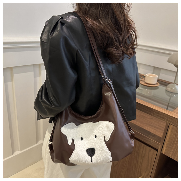 The new autumn and winter 2024 fashion cartoon backpack with simple, individual and niche design, single-shoulder bag and commuter tote bag undefined