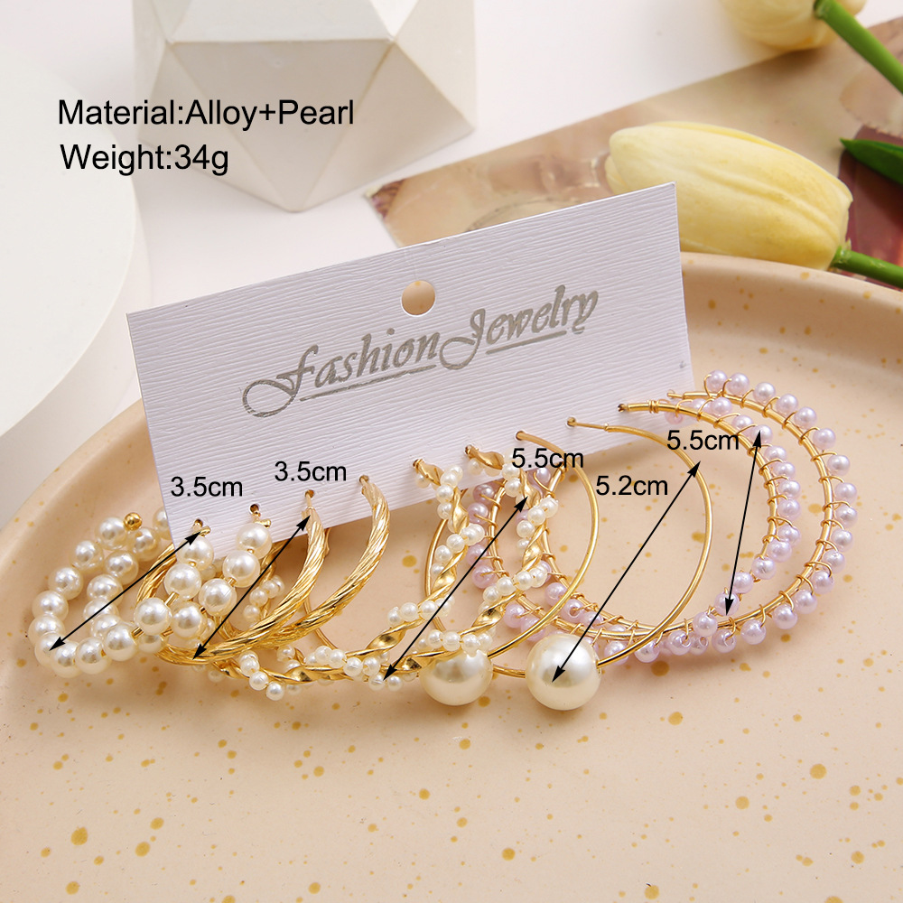 Fashion Twist Alloy Plating Artificial Pearls Earrings display picture 1