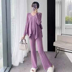 秋冬服と高級感のある洋服をセットにしたおしゃれな小香風ニットセーターのワイドパンツ2点セットの女性