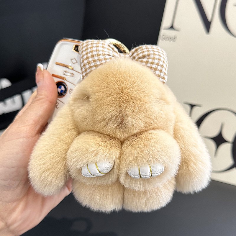 卸売りのかわいいウサギの毛の蝶結びの小さいウサギの自動車のキーホルダーはぬいぐるみのかばんを掛けて飾ります。